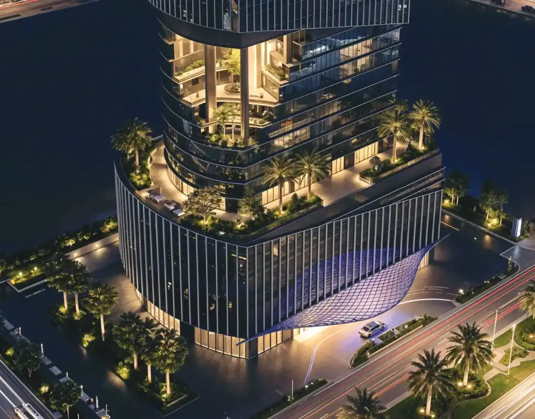 1970 Office Tower podium and lower floors lit at night in Business Bay, Dubai