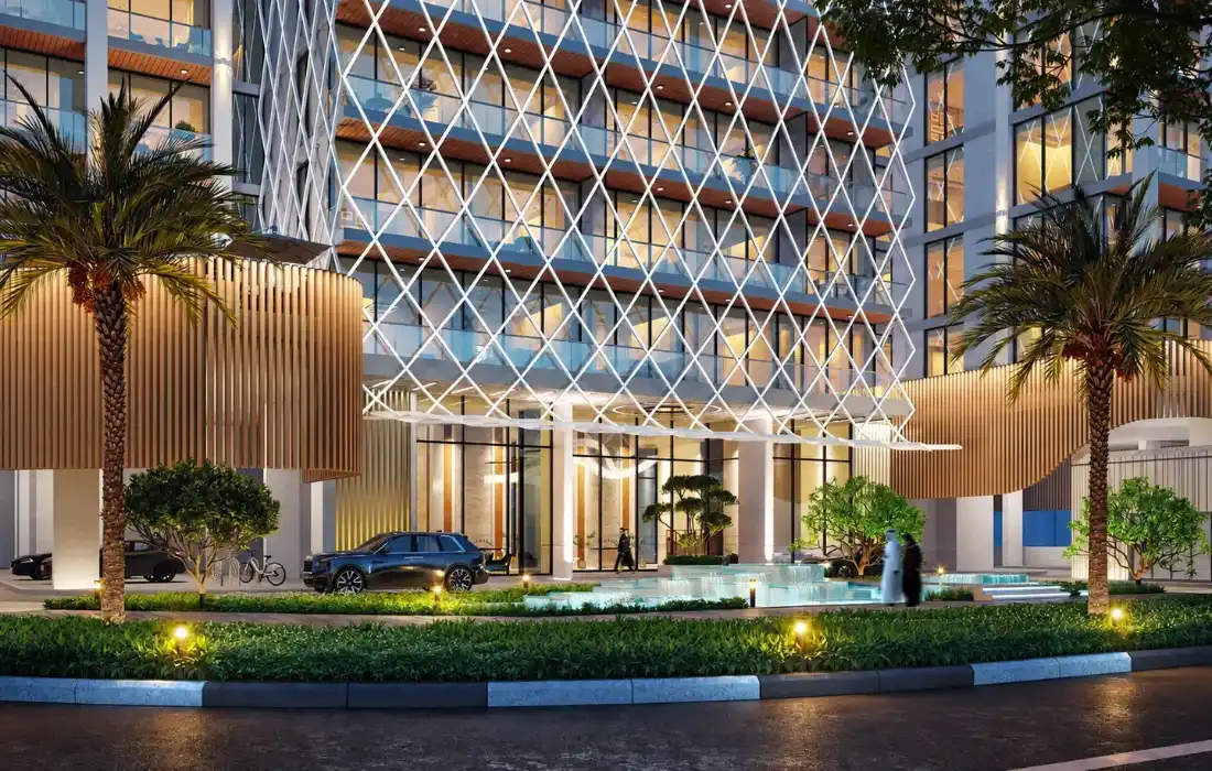 Marquis Aura illuminated entrance with landscaped drop-off