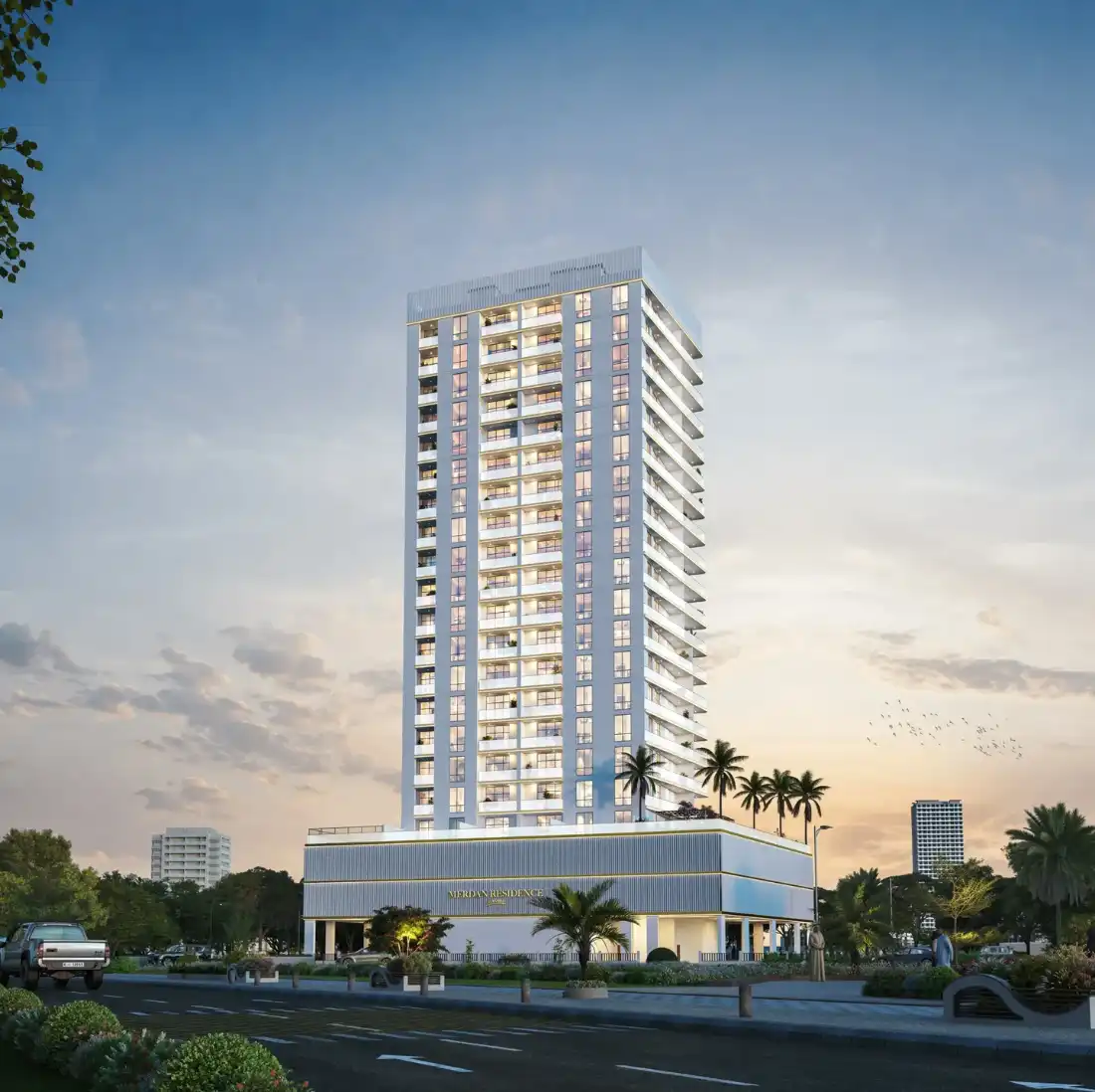 Merdan Residence tower by Evera Development in Dubai Sports City at dusk