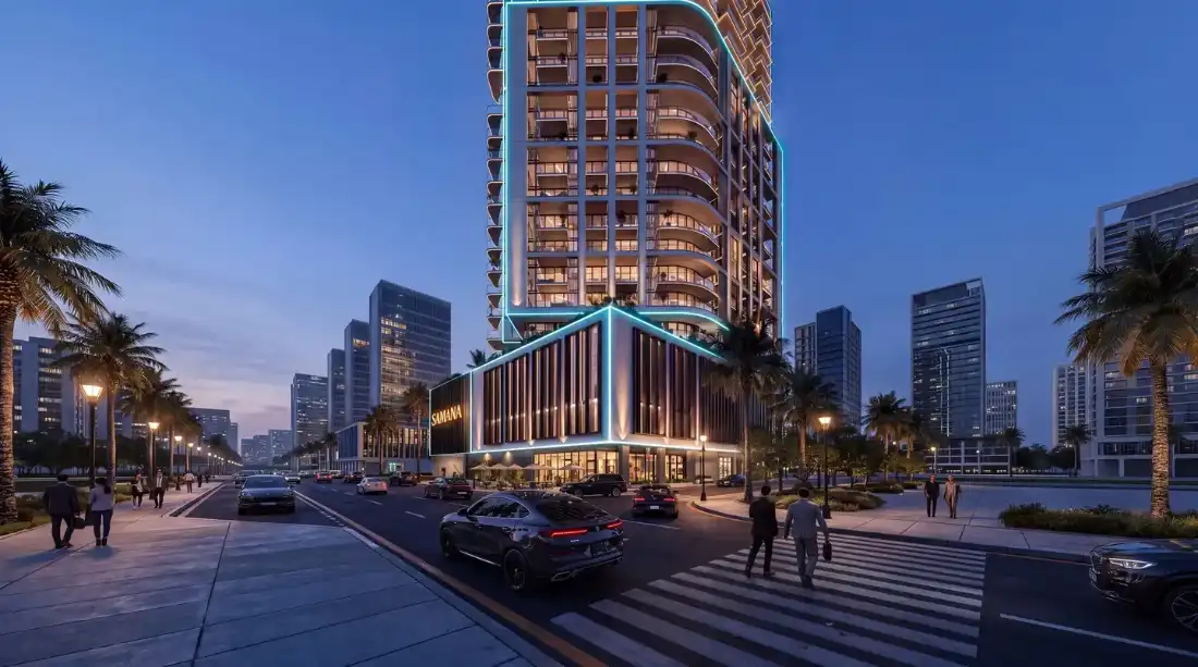 Samana Downtown One tower at dusk with architectural lighting