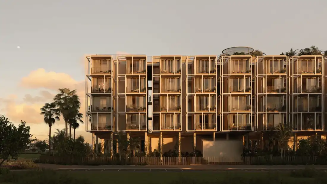 Tessera by Al Ghurair low-rise residential building in Dubai South at sunset