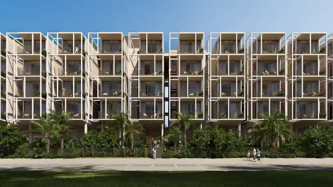 Tessera mosaic-inspired façade with balconies and greenery