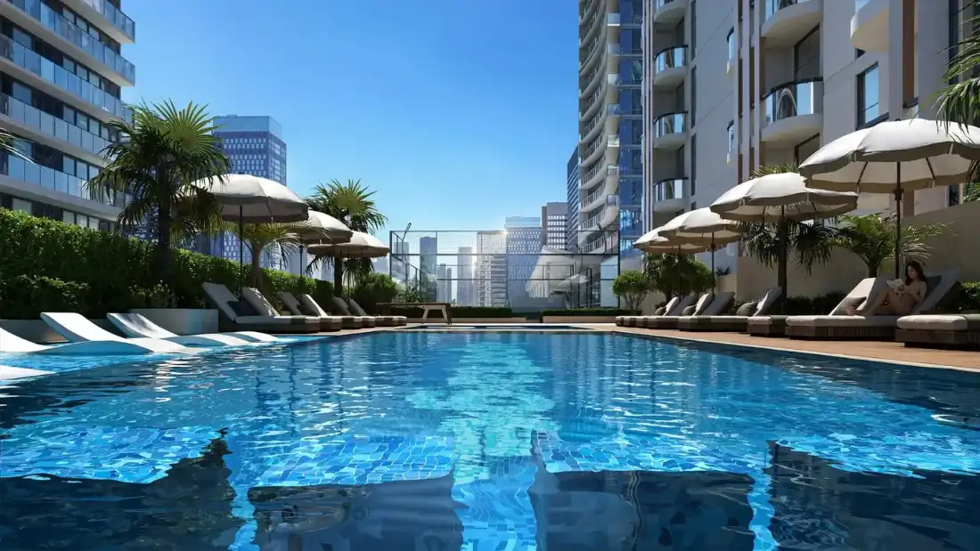 Verso swimming pool with sun loungers and city views