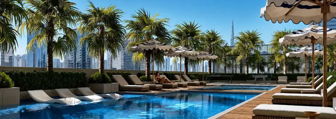 Verso podium pool deck with palm trees and shaded seating